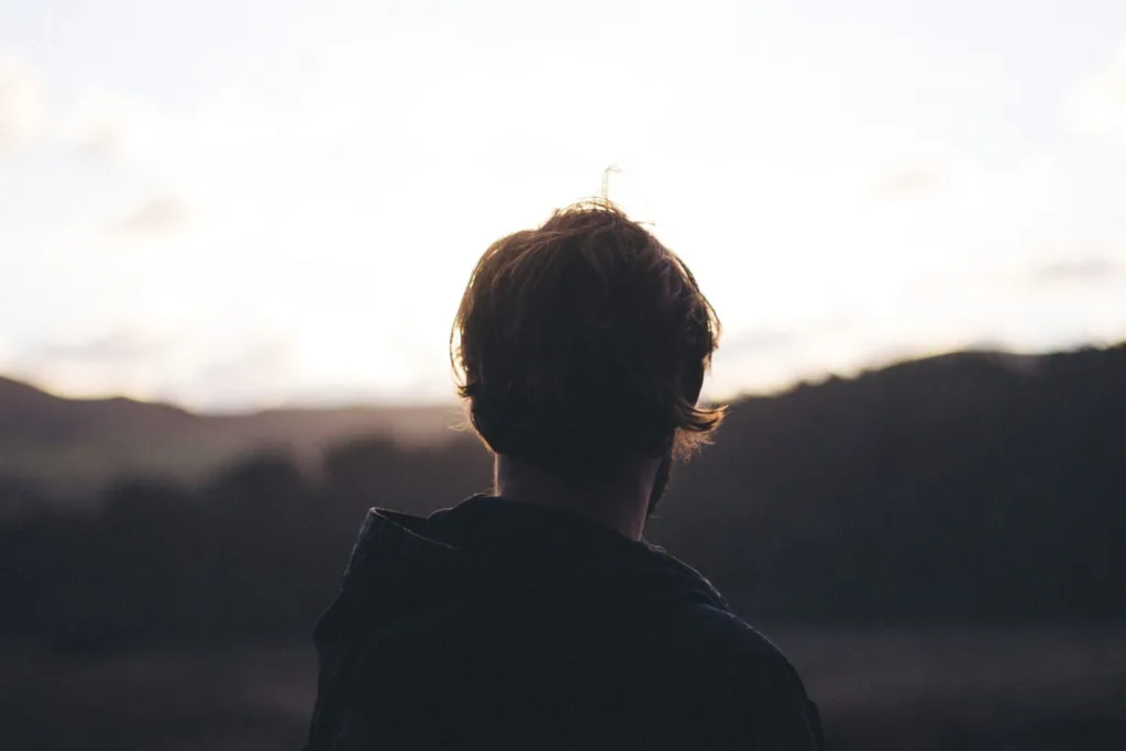 man looking into distance