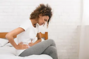 Woman suffering from a Bartholin Abscess or a Bartholin's cyst