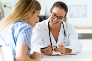 Woman discussing Hymenoplasty options with her doctor