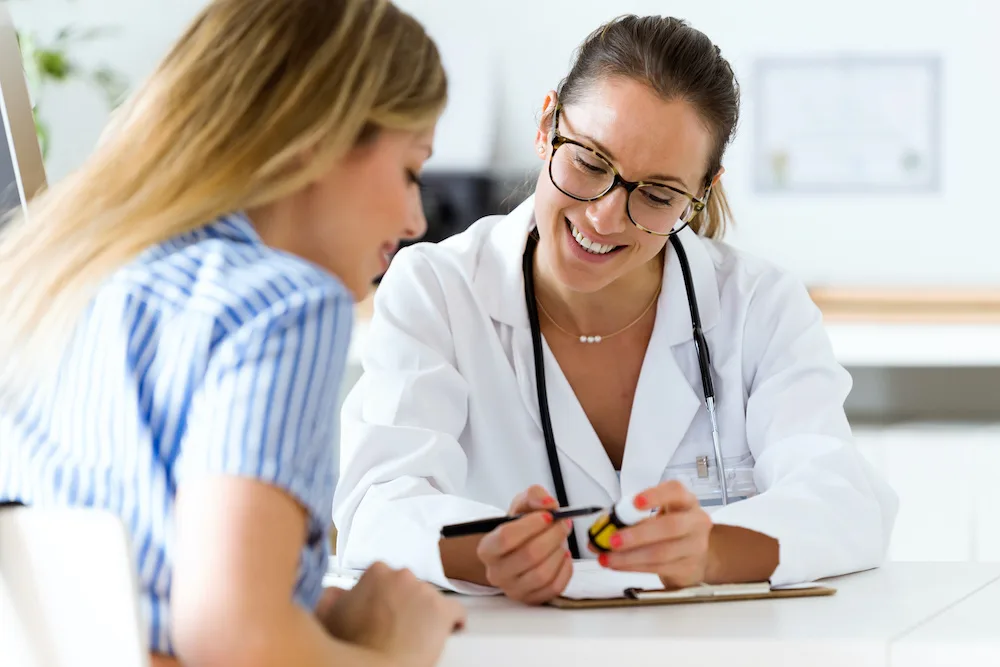 Woman discussing Hymenoplasty options with her doctor