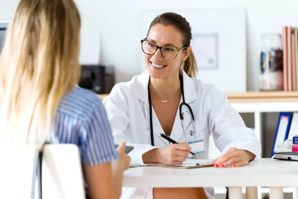 woman talking to her gynecologist about vaginal loosening