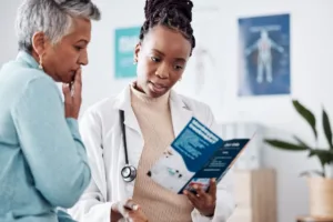A woman speaking to her doctor about non-surgical procedures.